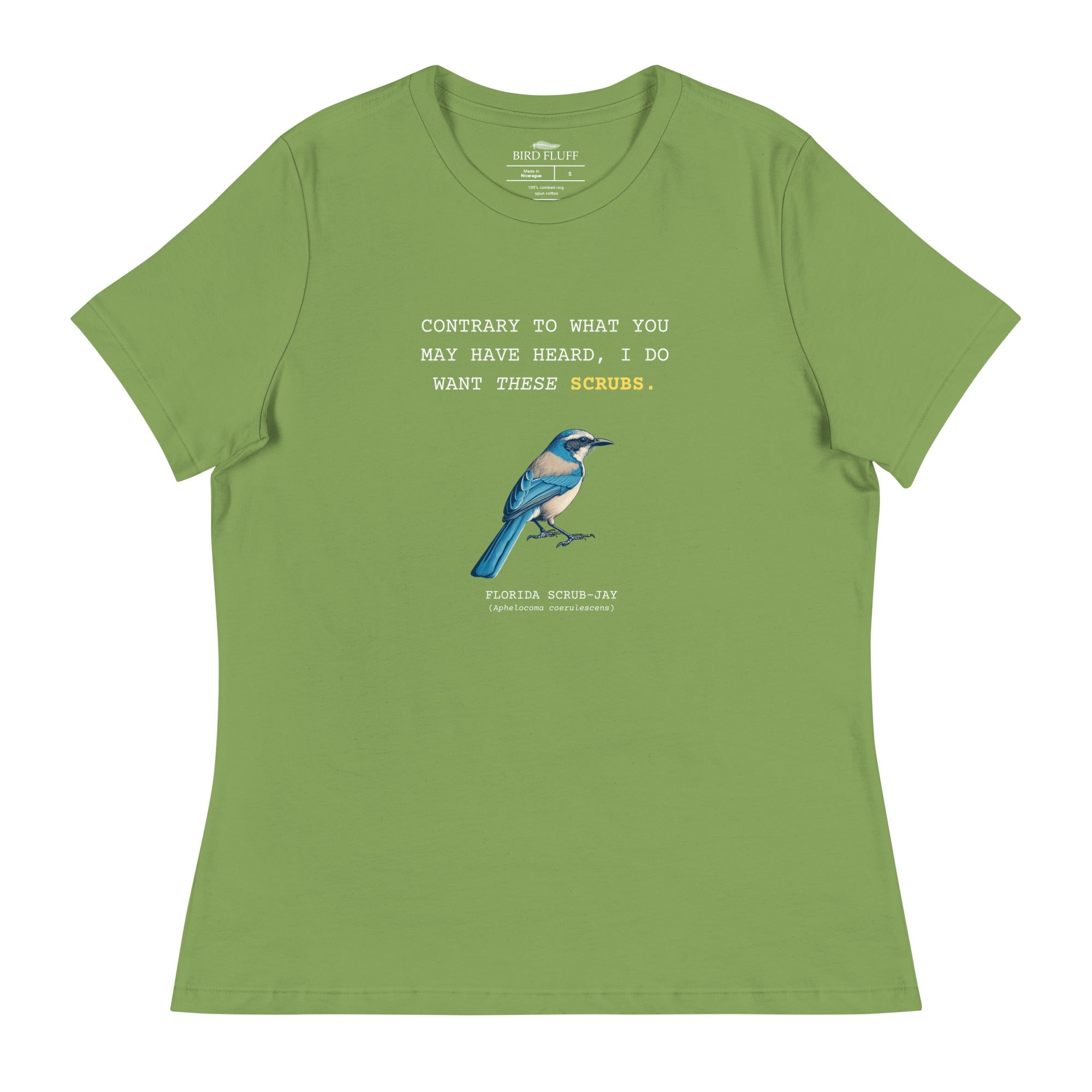 Leaf green women's bird shirt with the words I want these scrubs on the front above an illustration of a Florida scrub-jay.