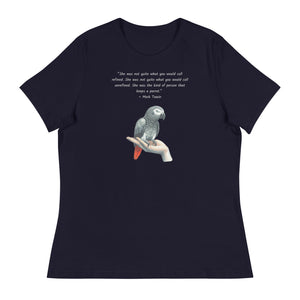 Navy bird shirt with a Mark Twain woman who keeps parrot quote and a illustration of an african grey parrot perched on a hand beneath.