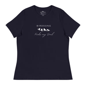 Navy blue women's bird t-shirt with the words Birdsong feeds my soul placed above and below a white graphic of 4 birds on a branch.