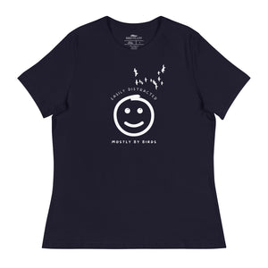 Navy blue women's bird t-shirt with a smiley face looking up and to the side at a flock of birds surrounded by the words, "Easily Distracted" above and, "Mostly by Birds" below.