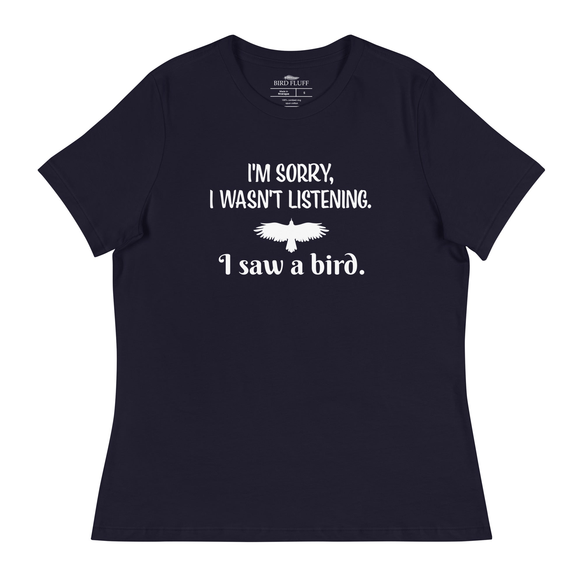 Navy blue women's bird t-shirt with the words I'm sorry I wasn't listening, I saw a bird. And a graphic of a bird flying.