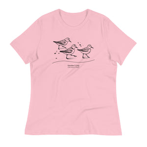 Pink bird shirt featuring an illustration of a three sanderlings on a beach and the common and scientific names for the bird underneath.