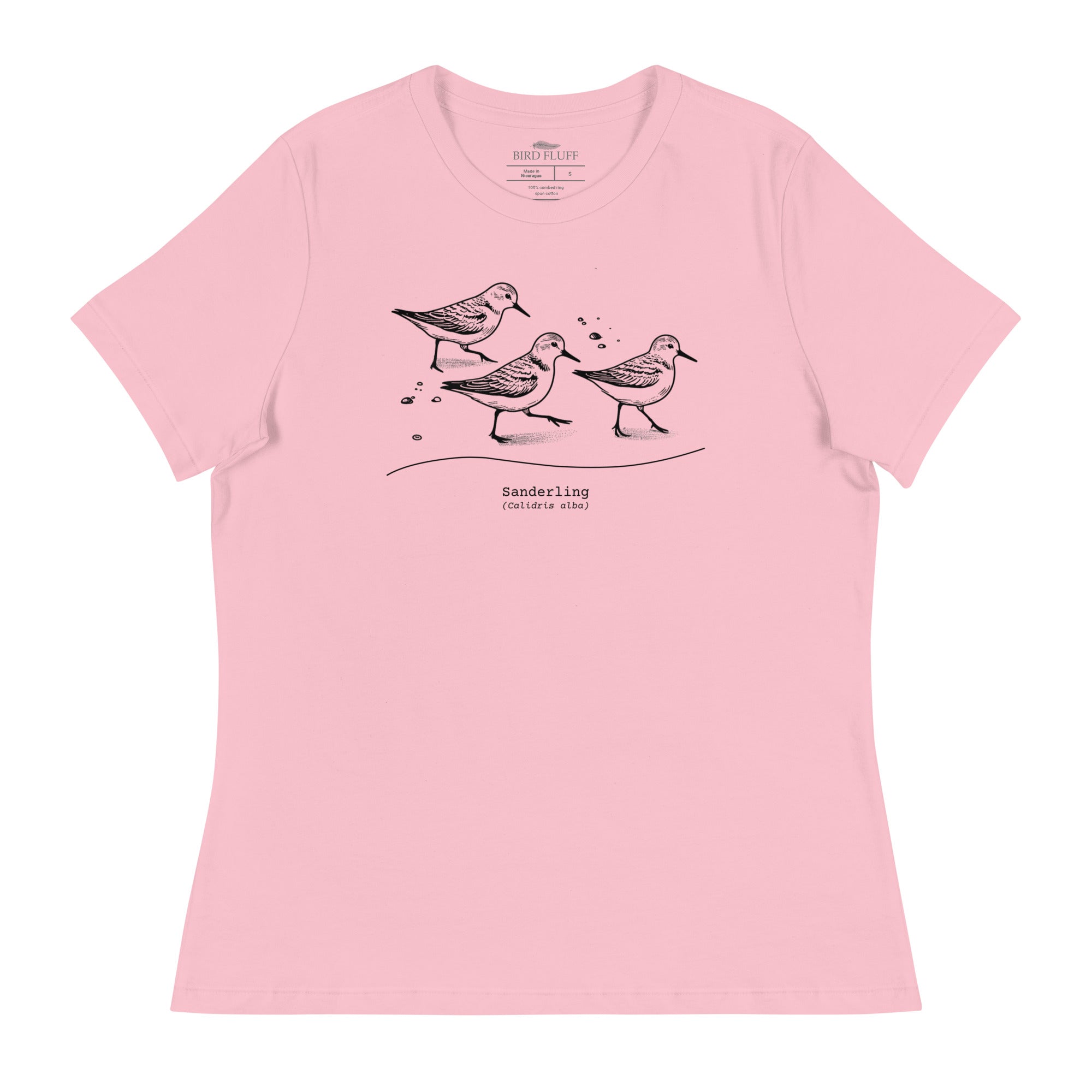 Light pink bird shirt featuring an illustration of a three sanderlings on a beach and the common and scientific names for the bird underneath.