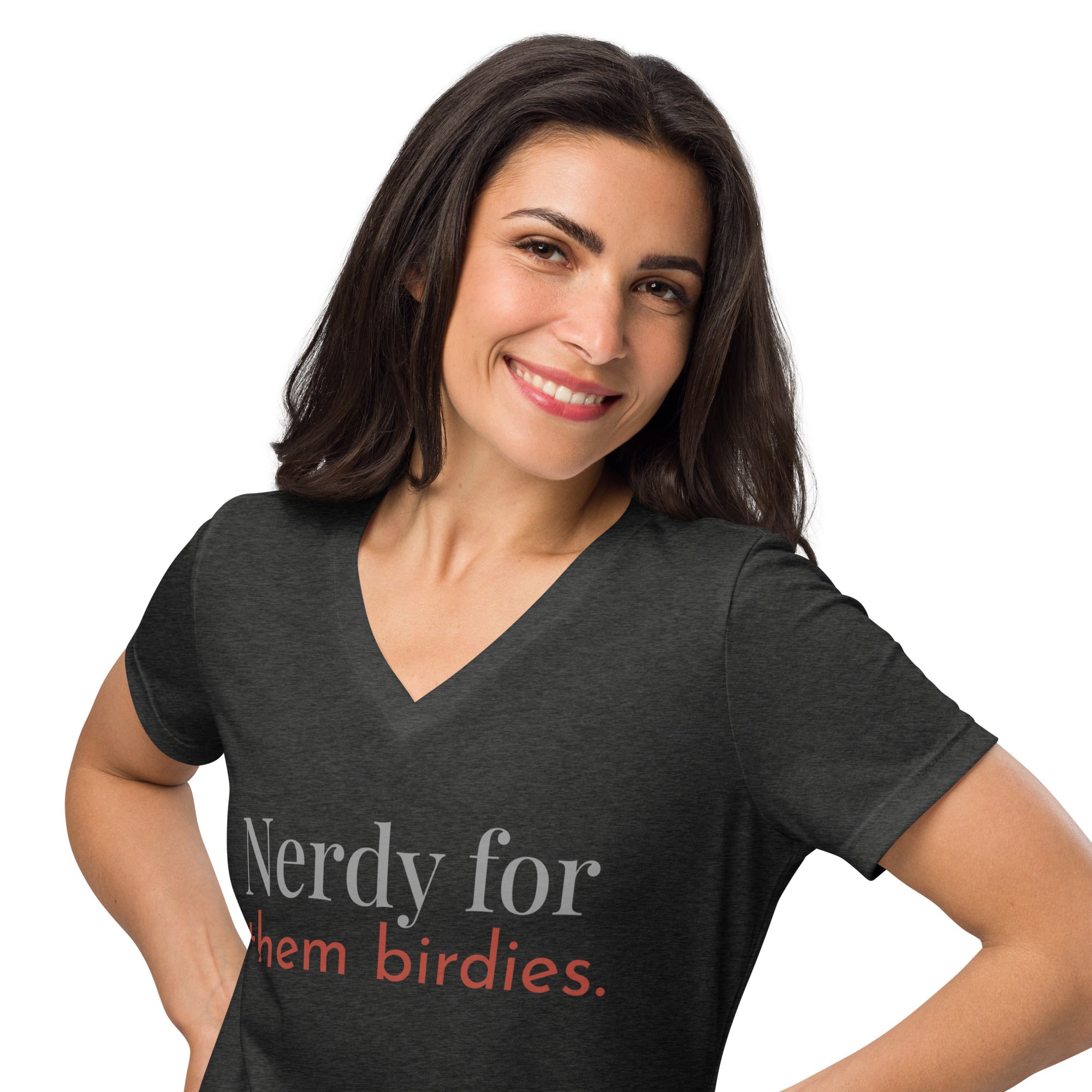 Heather dark grey women's v-neck bird shirt with the words Nerdy for them birdies on the front in two coordinating fonts and colors. Worn by a woman.