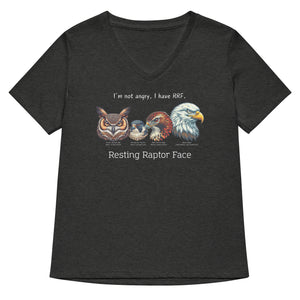 A heathered dark grey women's v-neck bird shirt with a great horned owl, a peregrine falcon, a red-tailed hawk and a bald eagle. The shirt has text that says, I'm not angry, I have RRF. Resting Raptor Face.