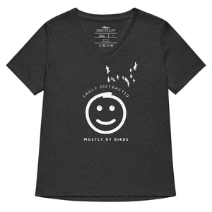 Dark heather grey women's v-neck bird t-shirt with a smiley face looking up and to the side at a flock of birds surrounded by the words, "Easily Distracted" above and, "Mostly by Birds" below.