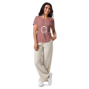 Heather mauve women's v-neck bird t-shirt with a smiley face looking up and to the side at a flock of birds surrounded by the words, "Easily Distracted" above and, "Mostly by Birds" below. Worn by a woman.