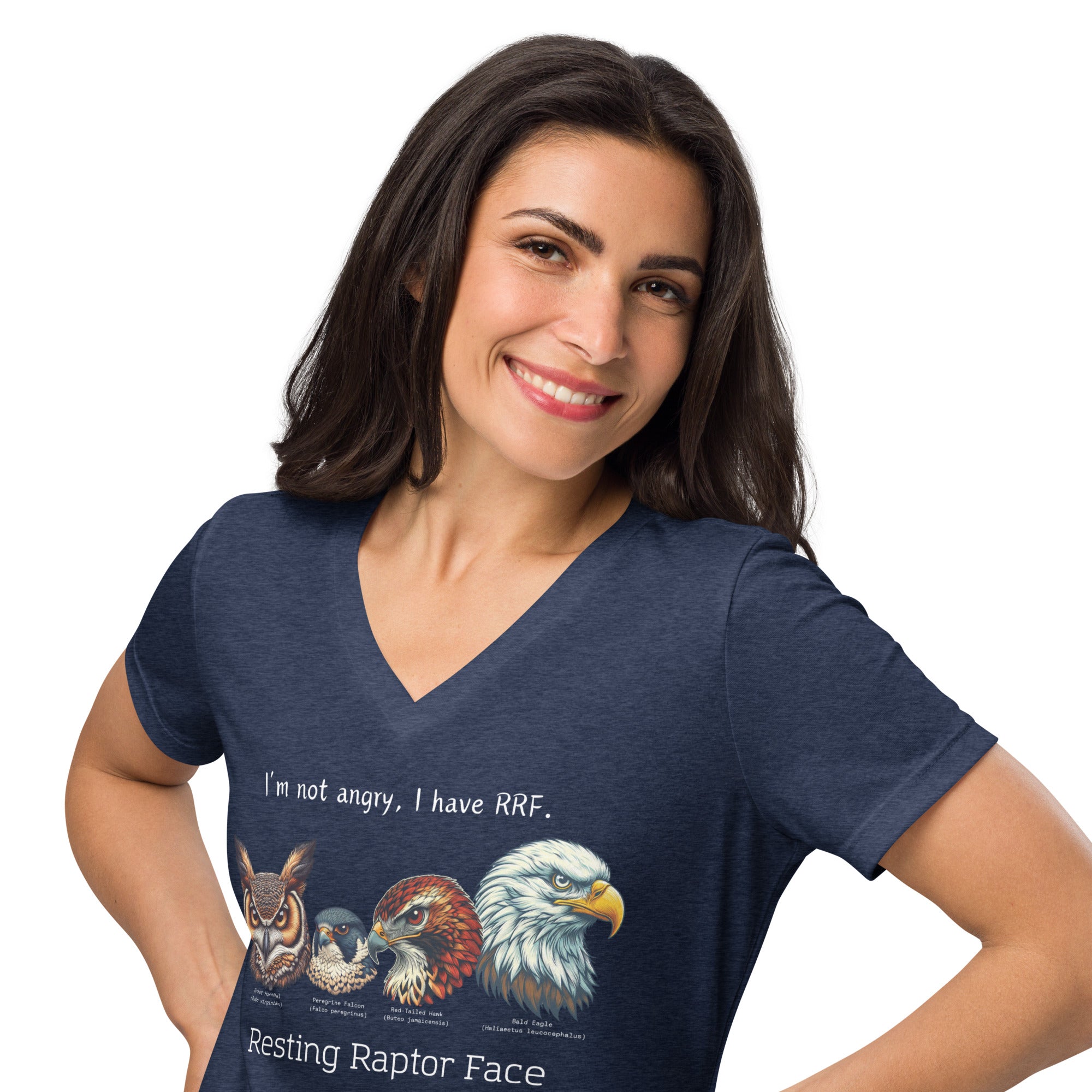 A heathered navy blue women's v-neck bird shirt with a great horned owl, a peregrine falcon, a red-tailed hawk and a bald eagle. The shirt has text that says, I'm not angry, I have RRF. Resting Raptor Face. Worn by a woman.