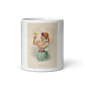 Bird mug. White coffee mug with three vintage remastered illustrations of girls in historical dress from the 1890s with birds.