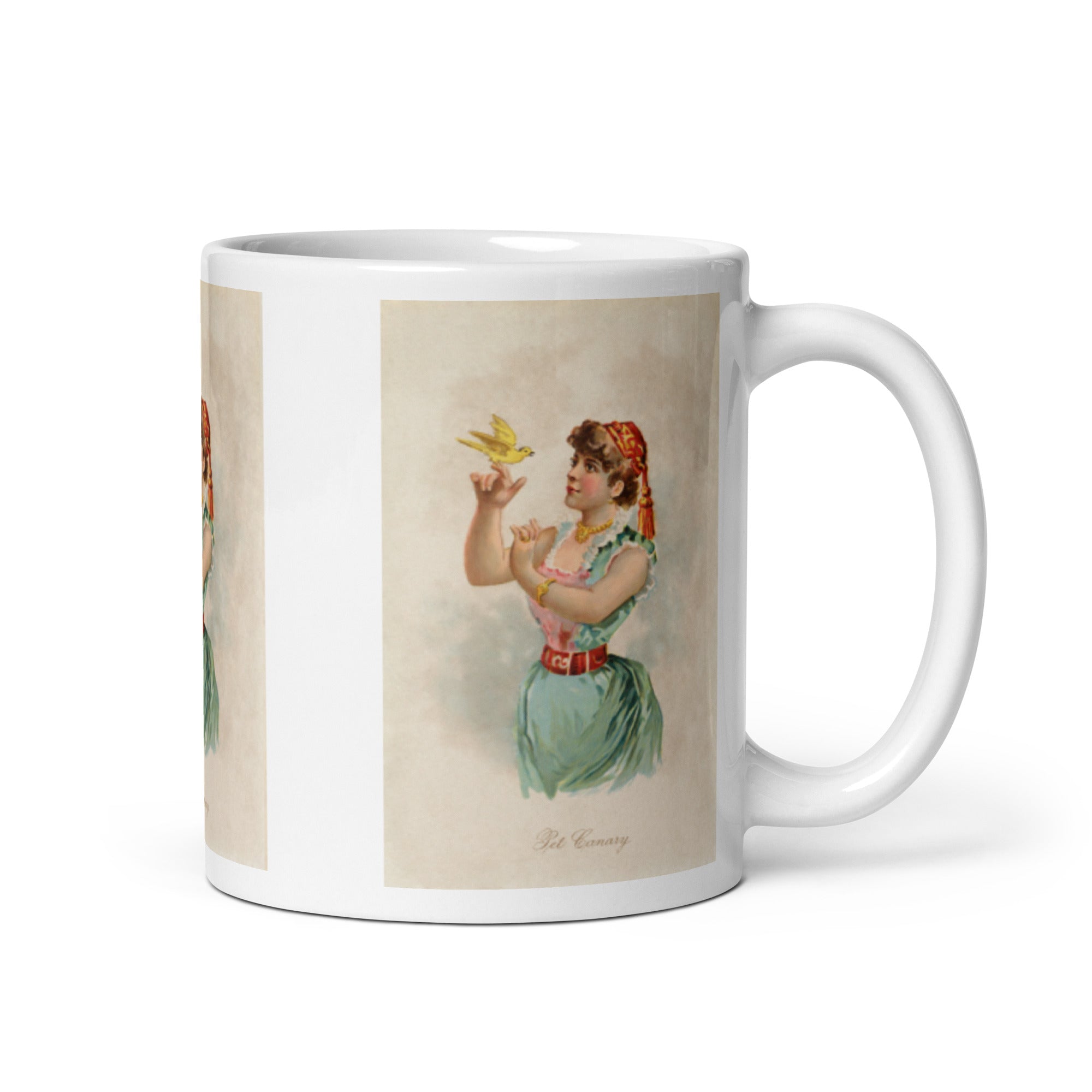 Bird mug. White coffee mug with three vintage remastered illustrations of girls in historical dress from the 1890s with birds.