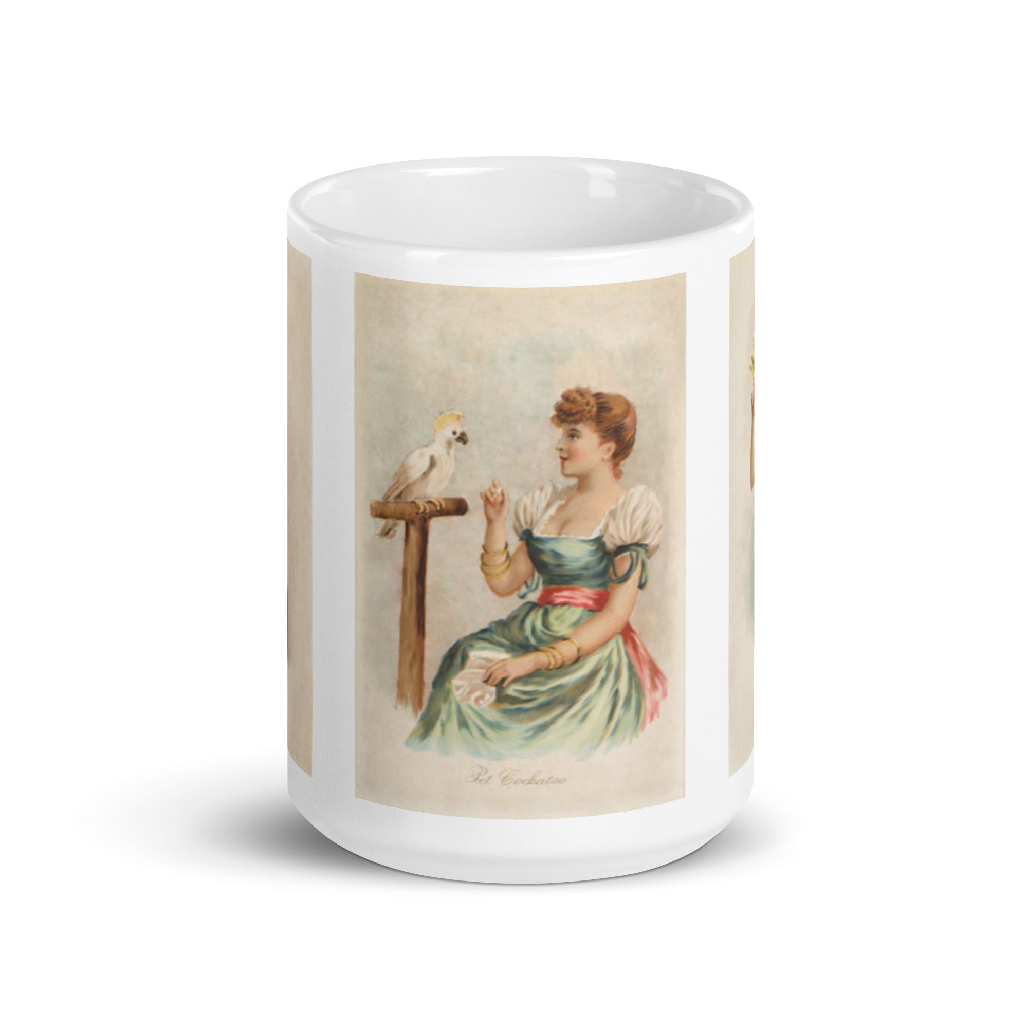 Bird mug. White coffee mug with three vintage remastered illustrations of girls in historical dress from the 1890s with birds.